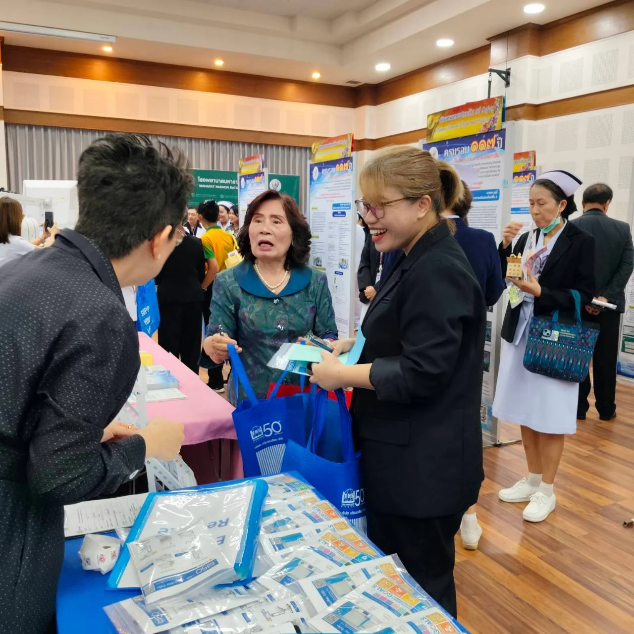 Visitors at the booth