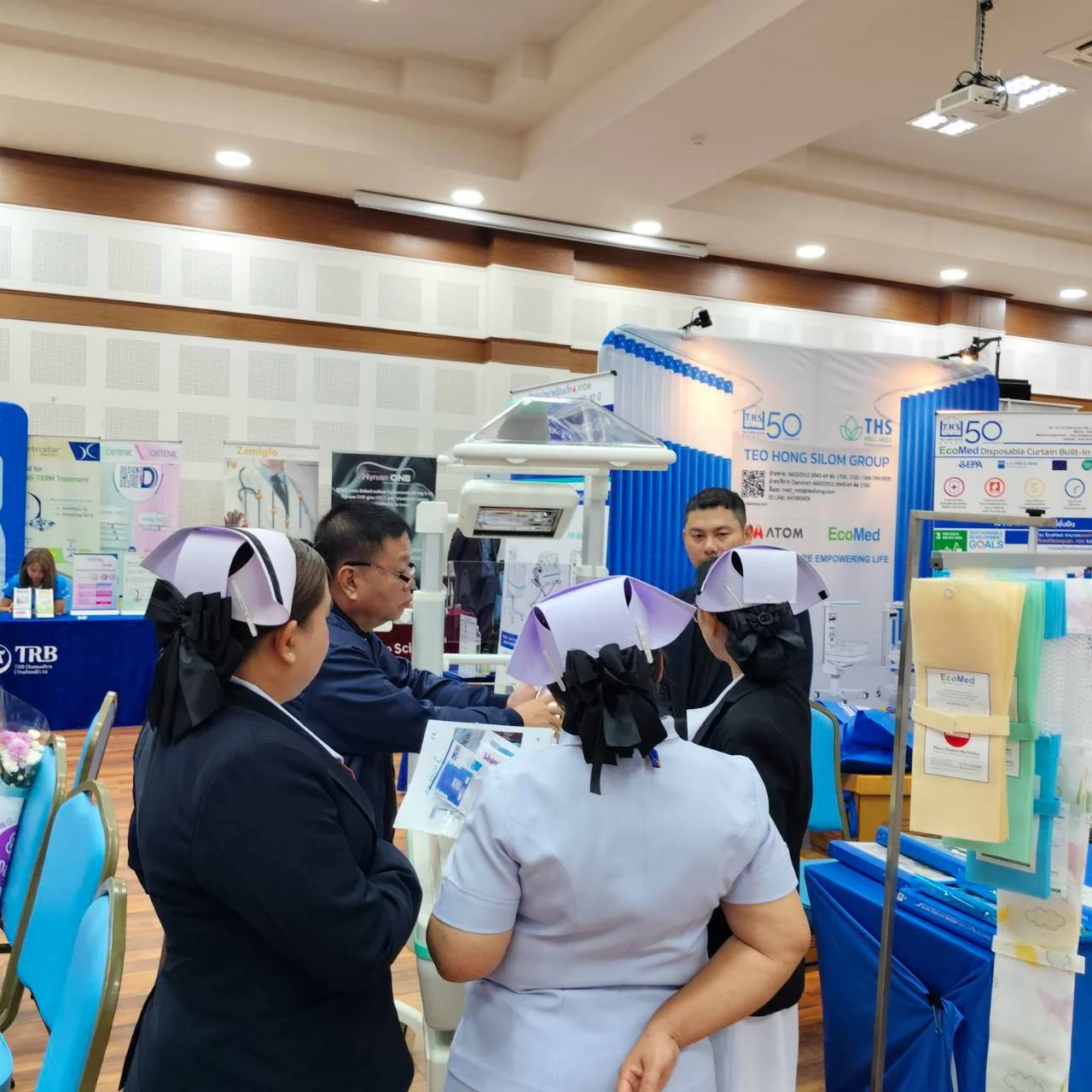 Healthcare professionals at the booth