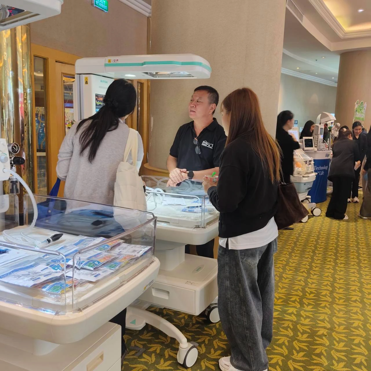 Attendees viewing medical equipment